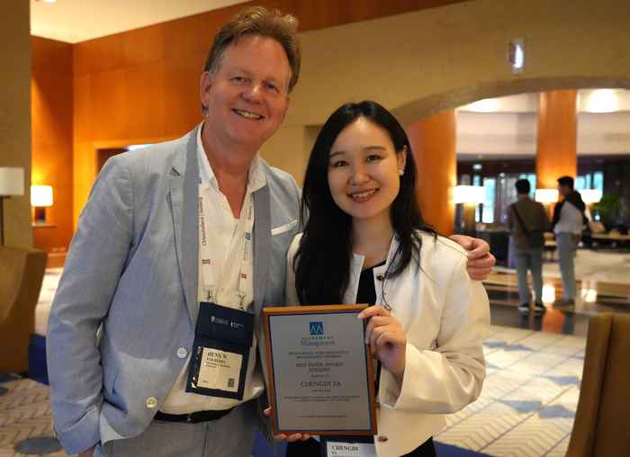 Chengdi Fa and Prof. Henk Volberda (L) at the Academy of Management Conference